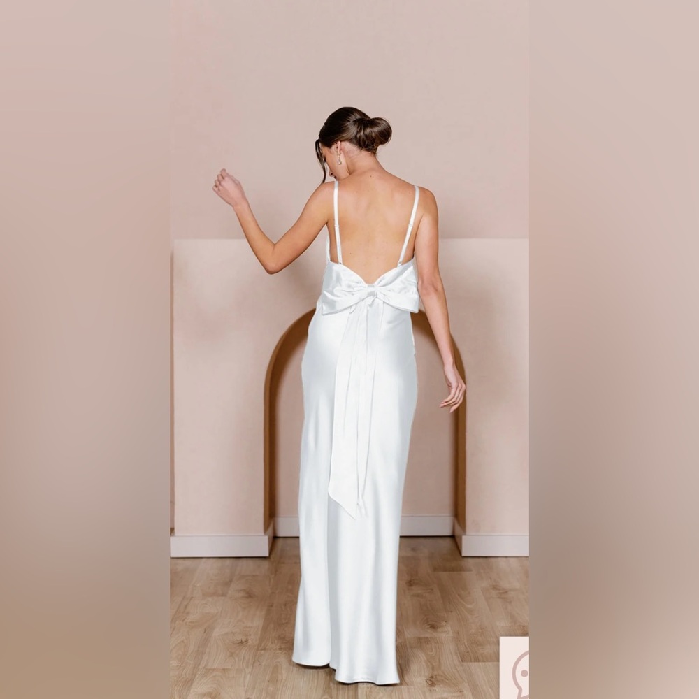 Revelry size 4 petite bow dress in white satin. Worn once for rehearsal dinner.